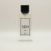 Clear glass perfume bottle labeled Dawn with black cap on a plain light background