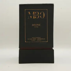 Black Divine Gold perfume box with gold lettering for luxury fragrance.
